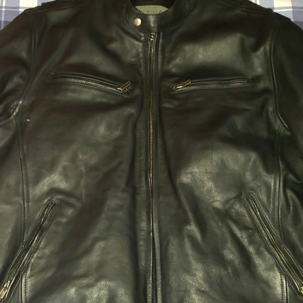 A set of leather chaps and coat